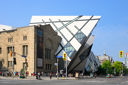 Toronto, Canada - July 1st, 2023: People line up in front of the Royal Ontario Museum.