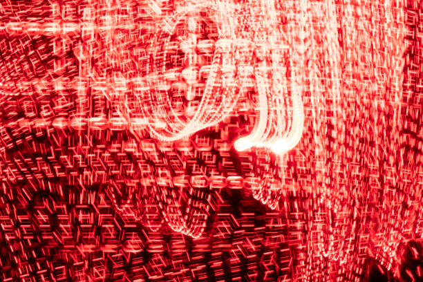 Night shot in Regent Street with Christmas lights above the road.
