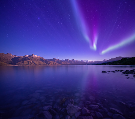 View of Mt Cook from Lake Pukaki under Northern Lights, In South Island, New Zealand.