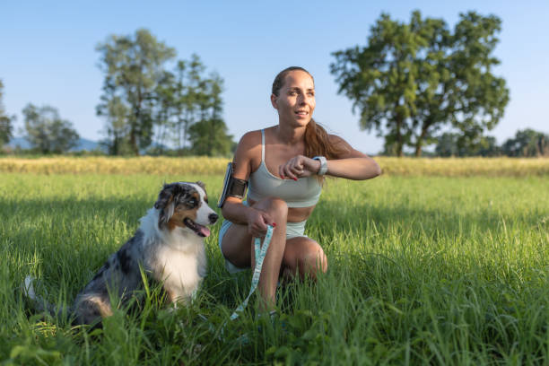 istock Woman with a dog after running 1508386455