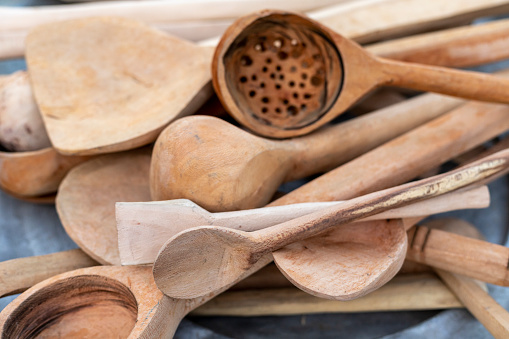Kitchenware set of wooden spoon closeup.