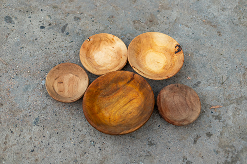 Wooden kitchen utensils bowls set.