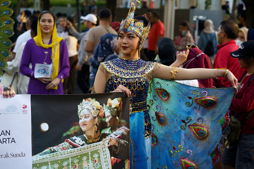 June 11, 2023 Peop wearing Indonesian traditional clothes at the Art carnival during Jakarta Car Free Day. Street Photography.