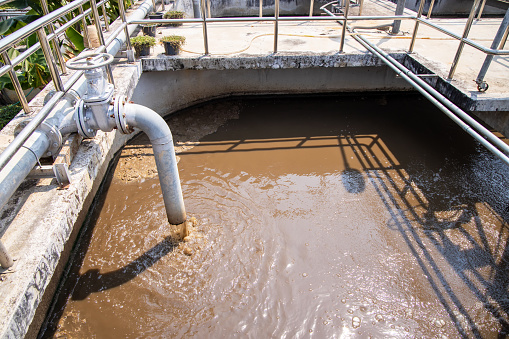 Sewage from drainpipe factory flowing to water treatment tank of sewage treatment plant.