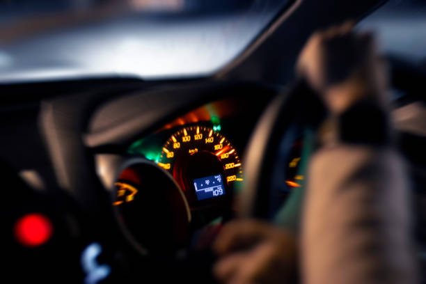 istock Hands on steering wheel a car moves at fast speed at the night. 1508442836