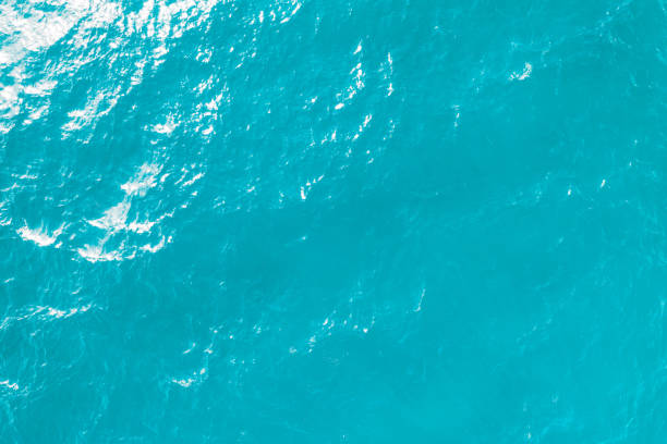 istock blue ocean waves background. Water surface on ocean. copy space area for text. Reflection on the surface of the ocean on a calm day. 1508473464