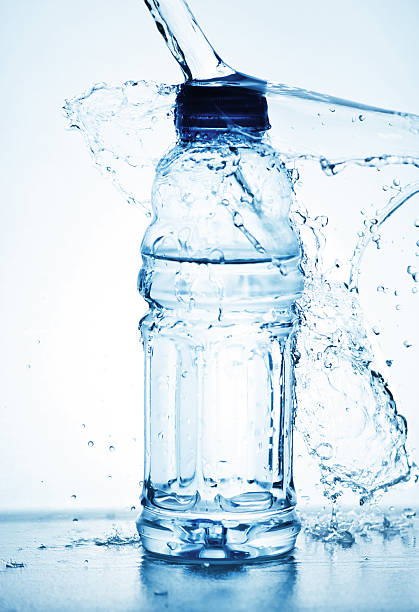 istock Water splash out of glass 150855070