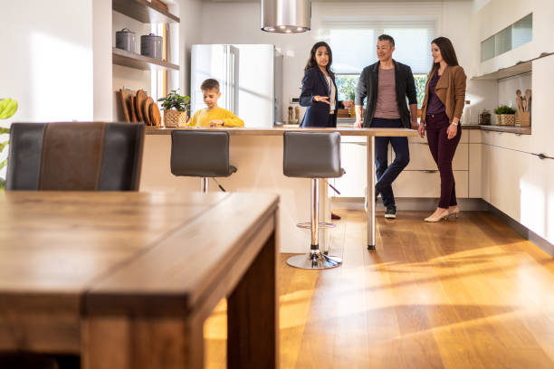 istock Real estate agent showing modern kitchen to couple 1508589852