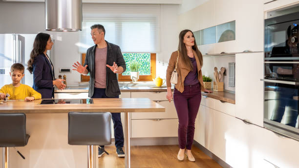 istock Real estate agent showing modern kitchen to couple 1508589858