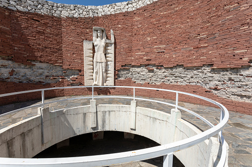 Perushtitsa, Bulgaria - 01 July 2023: The monument of the three generations rises on the historical hill Manyovo Bardo, Vlasevitsa peak, above the city center