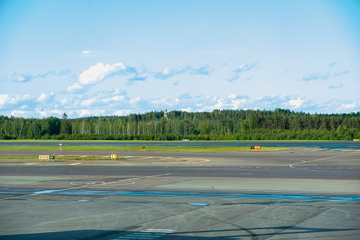 Runway at Vantaa Airport Helsinki Finland. summer landscape