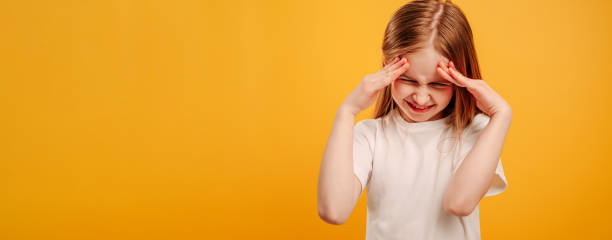istock Girl isolated on yellow background 1508610261