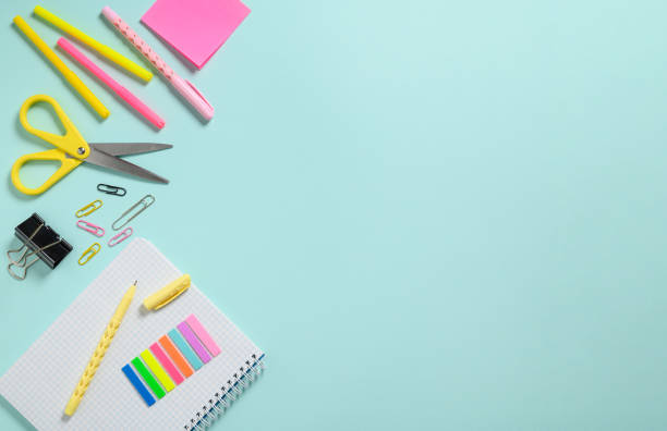istock office or school supplies on a blue background. empty space free for text 1508612450