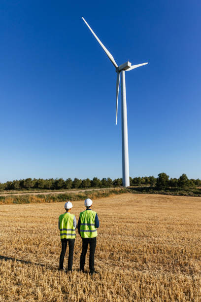 istock Engineers working in a wind turbine field. 1508616188