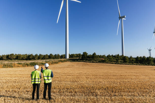 istock Professional engineers working together in a wind turbine field. 1508617908
