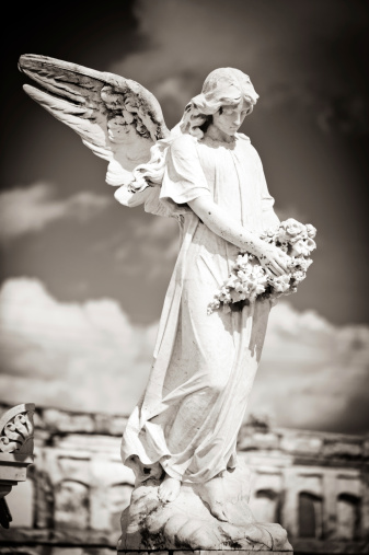 Angel statue at a cemetery La Reina, Ciefuegos, Cuba
