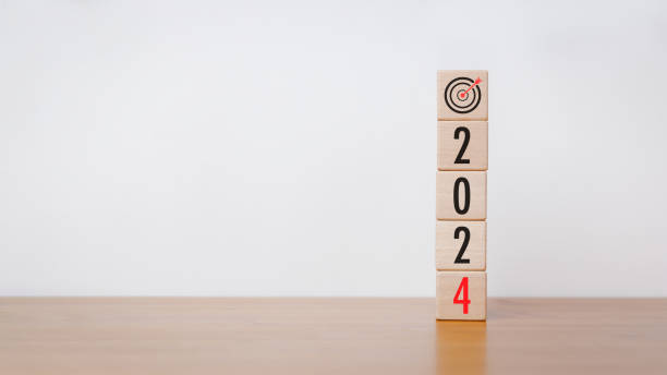 istock Wood cube block with 2024 text and arrow icon 1508639086