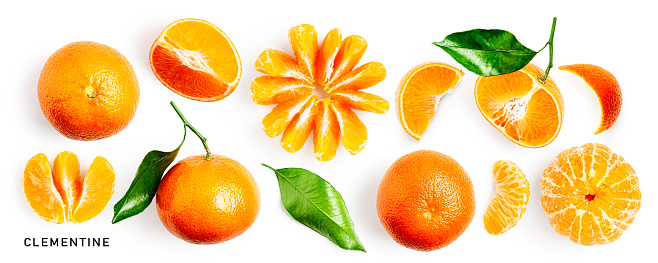 Fresh clementine fruit with leaves creative layout isolated on white background. Healthy eating and food concept. Tangerine mandarin citrus fruits collection. Flat lay, top view