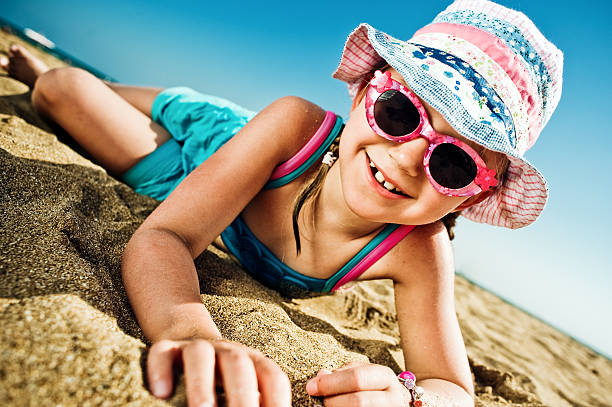 istock Little girl by the sea 150867853