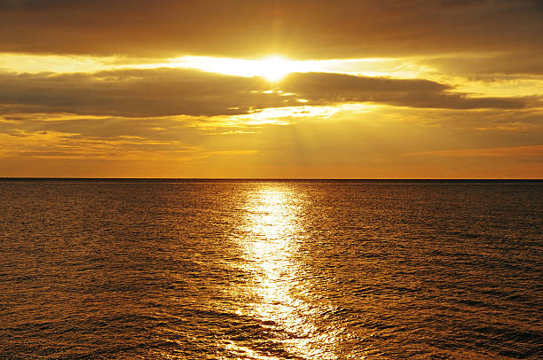 istock Sunrise in the sea 150868171