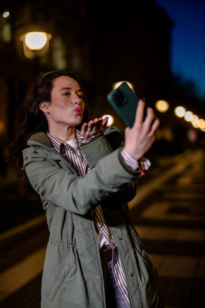 istock Young Woman Engaged in Video Call on the Go 1508719228