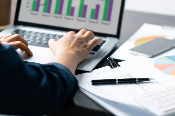istock Business Data Analysis on Laptop: Financial Charts, Graphs, Reports for Successful Planning and Strategy. Professional Workplace: Analyzing Business Data, Charts, Graphs for Strategic Decision Making 1508720272