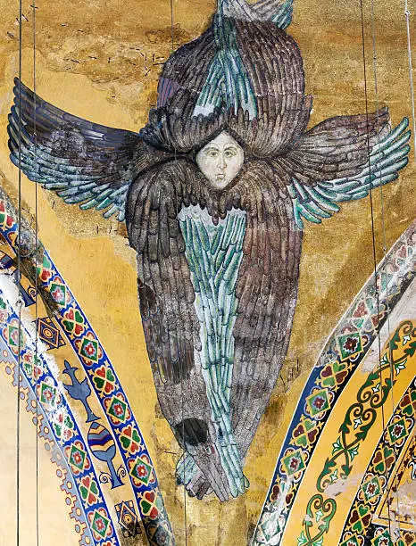 view of an ancient Byzantine mosaic depecting Seraphim in the old Hagia Sophia Orthodox Cathedral in Istanbul, Turkey. The exact age of the mosaic is unclear but believed to be more than 700 years. Shallow depth of field.