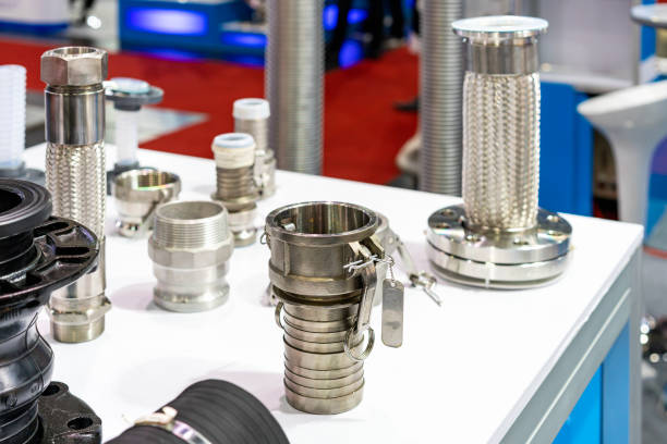 metal quick fitting or hose shank adapter coupling and other parts such as flexible connector tube in industrial on table