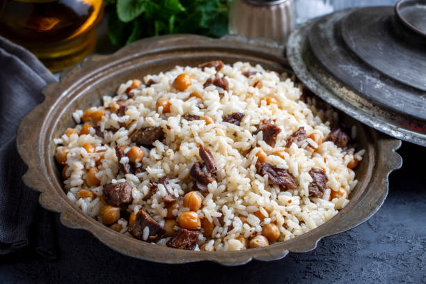 istock Traditional Turkish food; Roasted meat on rice (Turkish name; pilav üstü kavurma, kurban kavurma, nohutlu etli pilav) 1508763848