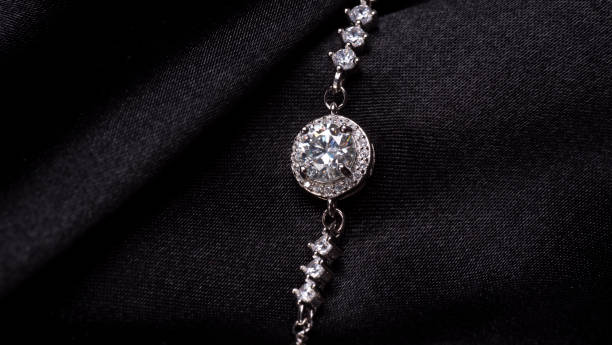 istock amazing silver diamond bracelet on a black background 1508773659