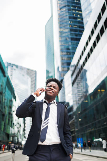 istock Young adult businessman using mobile while business trip 1508774212