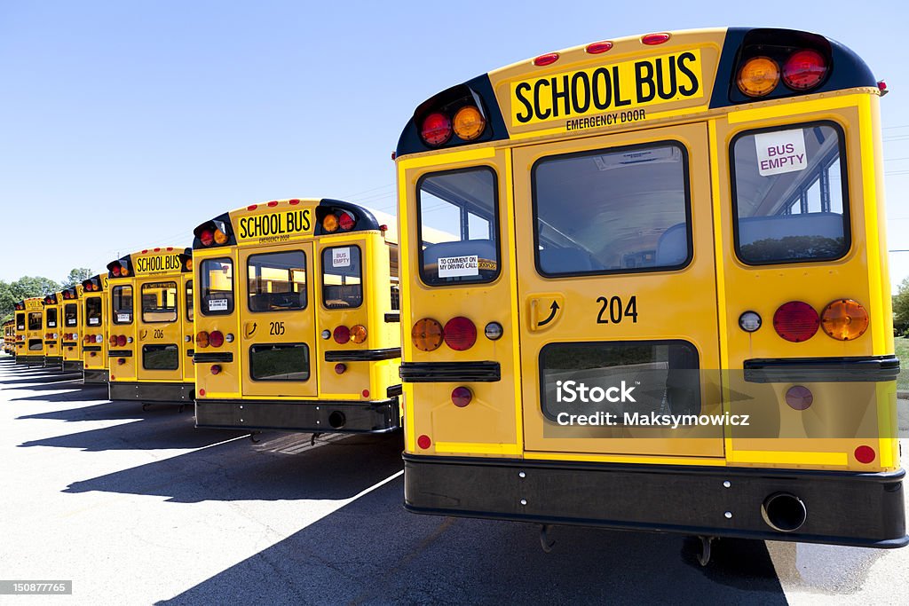 Yellow School Bus Yellow School Bus With Blue Sky Asphalt Stock Photo