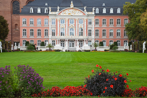 Warsaw, Poland - May 01, 2022: Beautiful  green spring park in the Krasinski Palace and garden in Warsaw. Palace Rzeczypospolitej at in spring