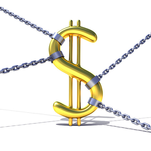 Dollar sign tied by chains stock photo