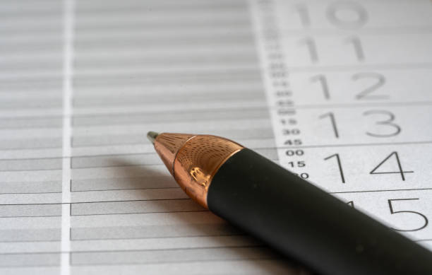 istock close up of a pen on a calendar 1508802549