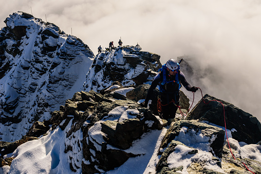 Grossglockner, Austria, 27th Semptember 2021 - Mountaineers climbing to the highest Austrian mountain Grossglockner.
