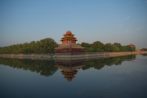 Chinese style garden scenery, ancient architectural attic on the lake