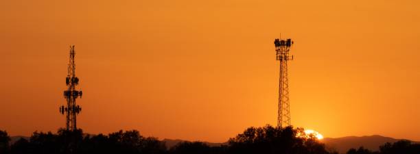 istock Panoramic shot of sunset behind two communication towers. 1508888931