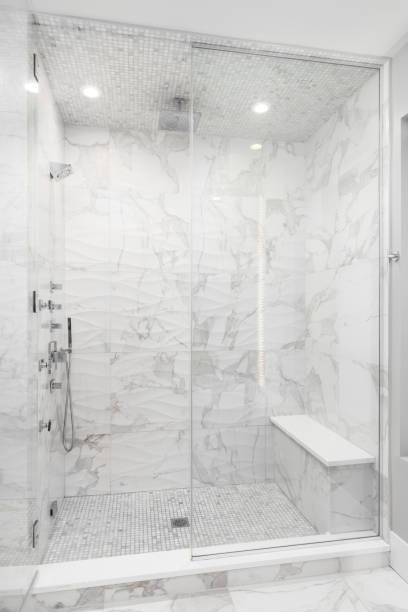 istock A walk-in shower with wavy tiles. 1508901255