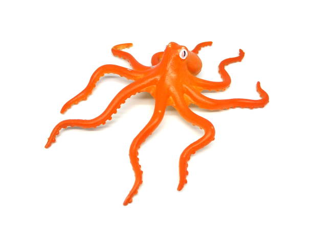 istock Close up of orange octopus toy isolated on white background. 1508908242
