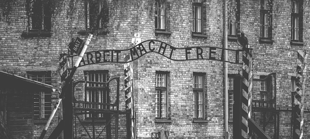 Poland, Auschwitz - April 18, 2014: Arbeit macht frei sign (Work liberates) in concentration camp Auschwitz
