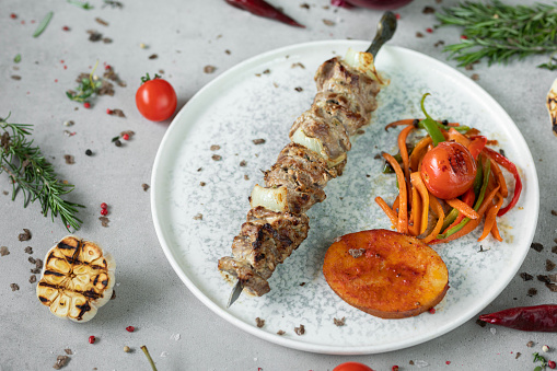 Kebabs grilled meat skewers, shish kebab set, on old dark  wooden table background, top view flat lay, with copy space for text