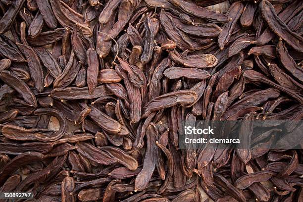 Carobs - Fotografias de stock e mais imagens de Alfarroba - Alfarroba, Algarobeira, África