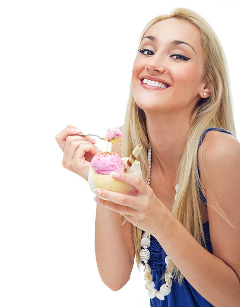 istock Happy woman eating ice cream,isolated on white 150894845