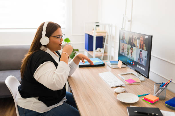 istock Plus size woman having coffee during a work video call 1508977570
