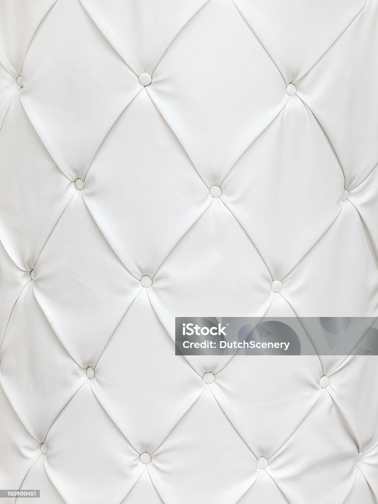 White leather texture with buttons White leather texture with buttons in a pattern Backgrounds Stock Photo