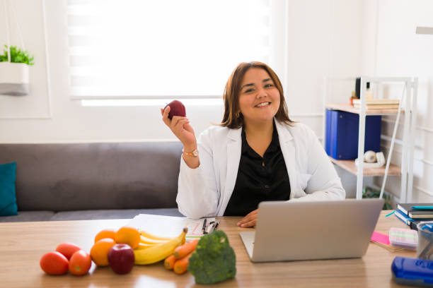 istock Attractive plus size nutritionist working and healthy eating 1509009022