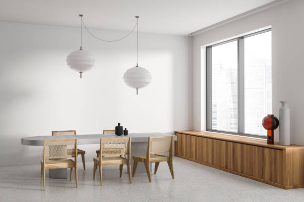 istock White and wooden dining room interior 1509031401