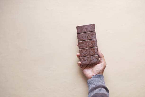 istock top view of holding a dark chocolate 1509033038