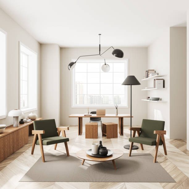 istock White home office interior with relax place, decoration and panoramic window 1509035741